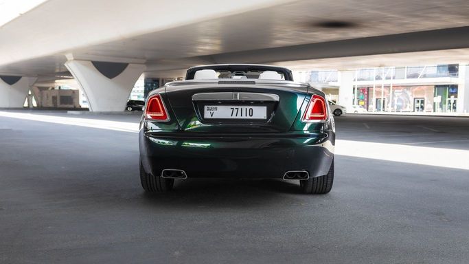 Rolls-Royce Dawn Black Badge, 2020 business cabriolet for rent in Dubai by AVA car rental, green color | AUTO.AE
