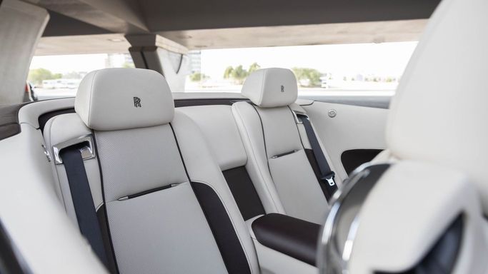 Rolls-Royce Dawn Black Badge, 2020 business cabriolet for rent in Dubai by AVA car rental, green color | AUTO.AE