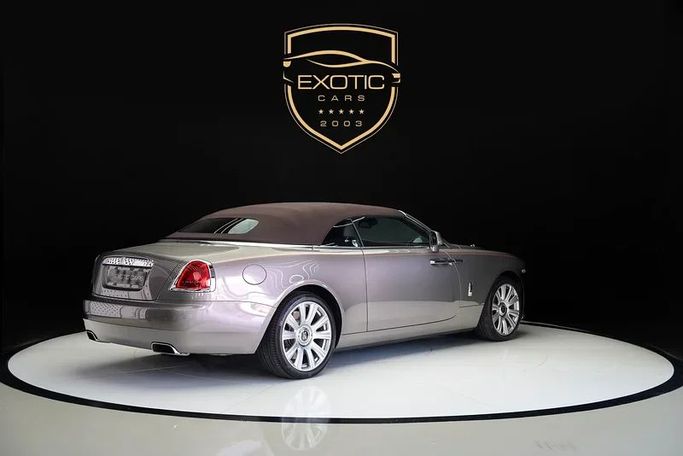 Подержанный Rolls-Royce Dawn, 6.6 л, 2017 в Дубае от Exotic Cars Коричневый цвет. GCC | AUTO.AE