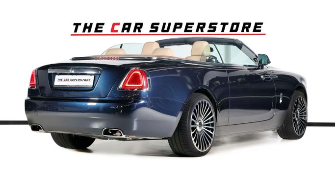 Подержанный Rolls-Royce Dawn, 6.6 л, 2016 в Дубае от The Car Superstore Синий цвет. Европейская | AUTO.AE