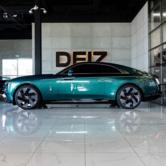 Rolls-Royce Spectre, 2024 business coupe for rent in Dubai by DEIZ, green color | AUTO.AE