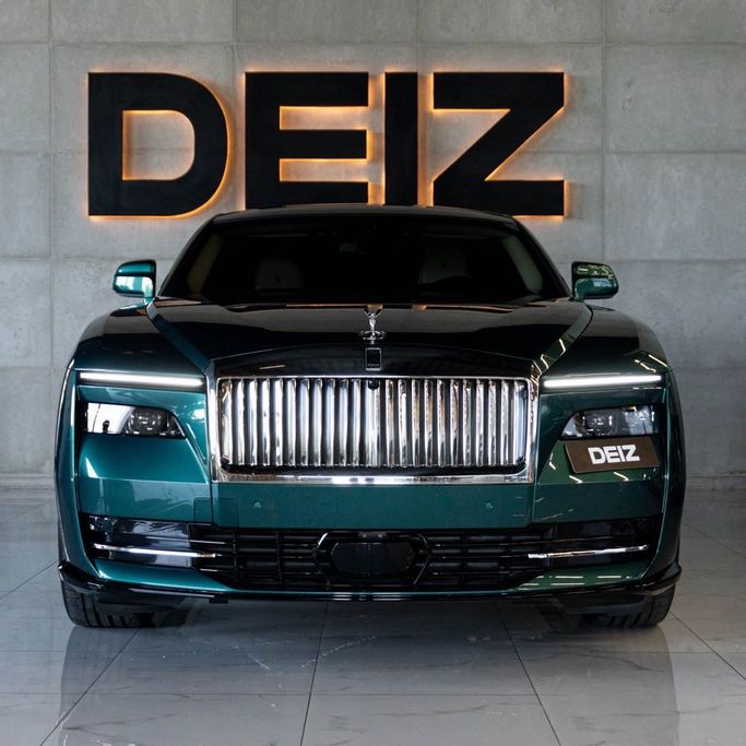 Rolls-Royce Spectre, 2024 business coupe for rent in Dubai by DEIZ, green color | AUTO.AE
