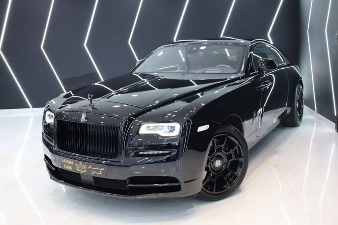 Подержанный Rolls-Royce Wraith Black Badge, 6.6 л, 2017 в Дубае от Sanam Cars Черный цвет. GCC | AUTO.AE