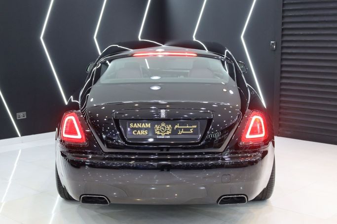 Подержанный Rolls-Royce Wraith Black Badge, 6.6 л, 2017 в Дубае от Sanam Cars Черный цвет. GCC | AUTO.AE