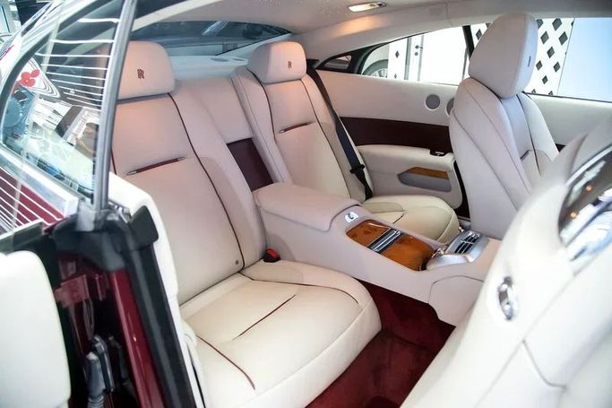 Used Rolls-Royce Wraith, 6.6 l, 2019 in Dubai by Exotic Cars, Maroon color. GCC Specs | AUTO.AE