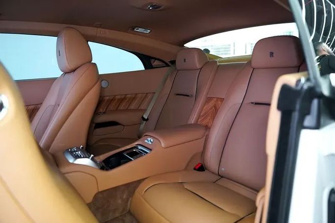 Used Rolls-Royce Wraith, 6.6 l, 2017 in Dubai by Exotic Cars, Golden color. GCC Specs | AUTO.AE
