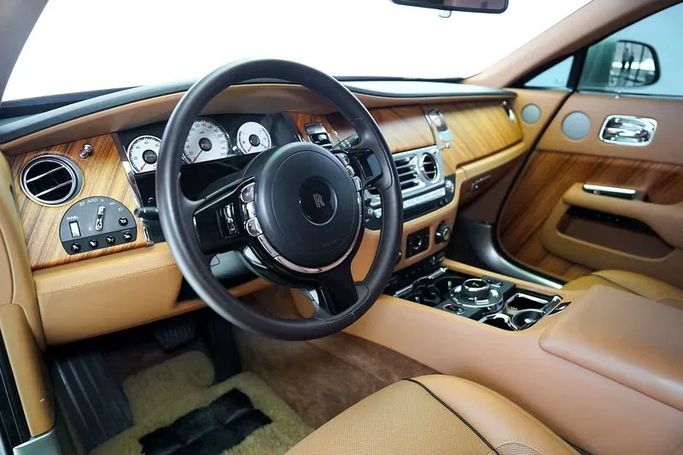 Used Rolls-Royce Wraith, 6.6 l, 2017 in Dubai by Exotic Cars, Golden color. GCC Specs | AUTO.AE