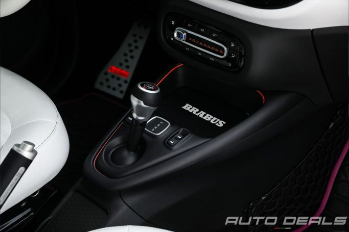 Подержанный Smart Fortwo III, 2023 в Дубае от AUTO DEALS Пурпурный цвет. Европейская | AUTO.AE