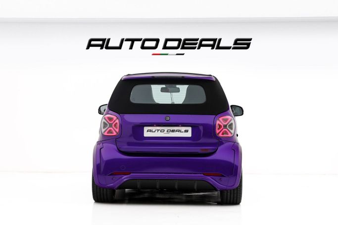 Подержанный Smart Fortwo III, 2023 в Дубае от AUTO DEALS Пурпурный цвет. Европейская | AUTO.AE