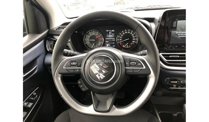 New Suzuki Baleno III, 1.5 l, 2025 in Dubai by SK Motors, White color. GCC Specs | AUTO.AE