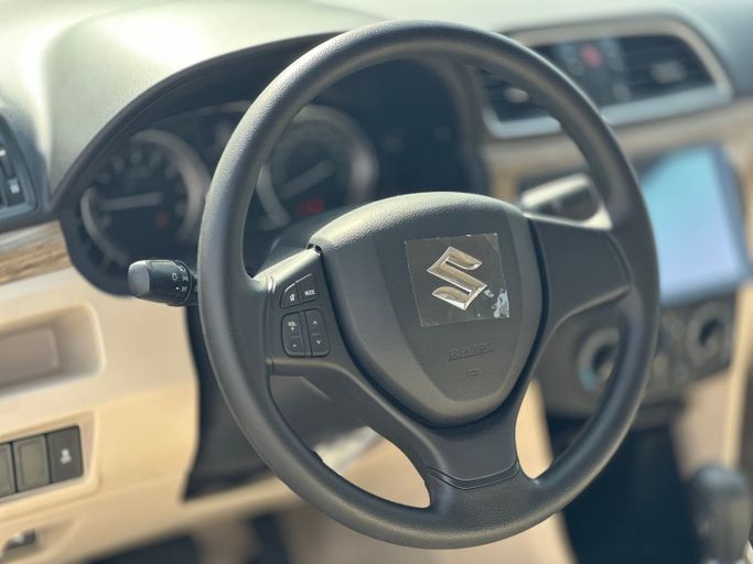 Новый Suzuki Ciaz I Рестайлинг, 1.5 л, 2025 в Дубае от MENAMOTORS Белый цвет. Other | AUTO.AE