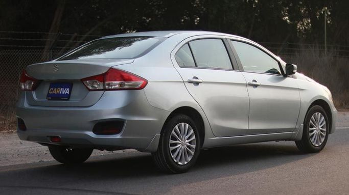 Used Suzuki Ciaz I Facelift, 1.5 l, 2024 in Dubai by Cariva Used Cars , Grey color. GCC Specs | AUTO.AE