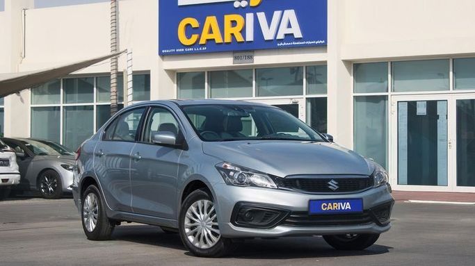 Подержанный Suzuki Ciaz I Рестайлинг, 1.5 л, 2024 в Дубае от Cariva Used Cars  Серый цвет. GCC | AUTO.AE