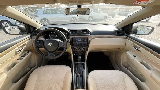 Подержанный Suzuki Ciaz I Рестайлинг, 1.5 л, 2024 в Дубае от Cariva Used Cars  Серый цвет. GCC | AUTO.AE