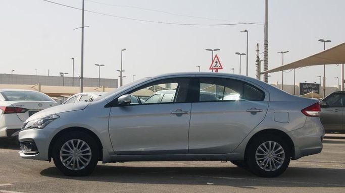 Подержанный Suzuki Ciaz I Рестайлинг, 1.5 л, 2024 в Дубае от Cariva Used Cars  Серый цвет. GCC | AUTO.AE