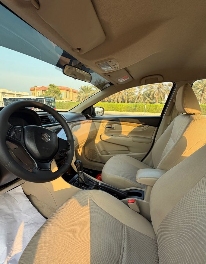 Подержанный Suzuki Ciaz I Рестайлинг, 1.5 л, 2023 в ОАЭ, Дубай Коричневый цвет. GCC | AUTO.AE | Объявление #295520 — фото 12 из 12