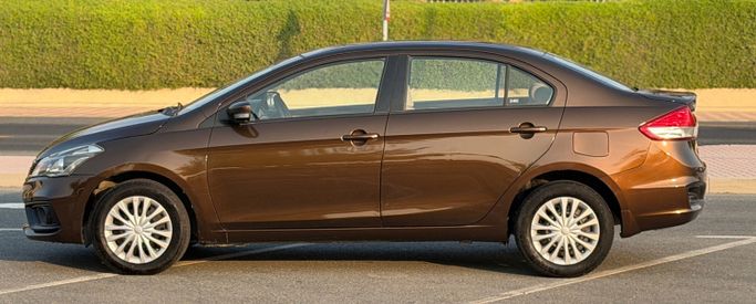 Подержанный Suzuki Ciaz I Рестайлинг, 1.5 л, 2023 в ОАЭ, Дубай Коричневый цвет. GCC | AUTO.AE | Объявление #295520 — фото 7 из 12