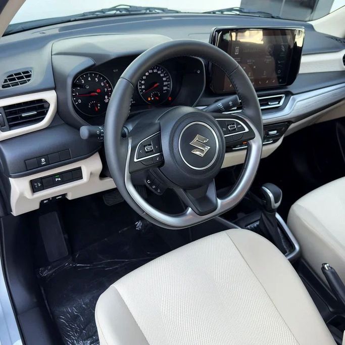 New Suzuki DZire IV, 1.2 l, 2025 in Dubai by Sola Motors, Grey color. GCC Specs | AUTO.AE