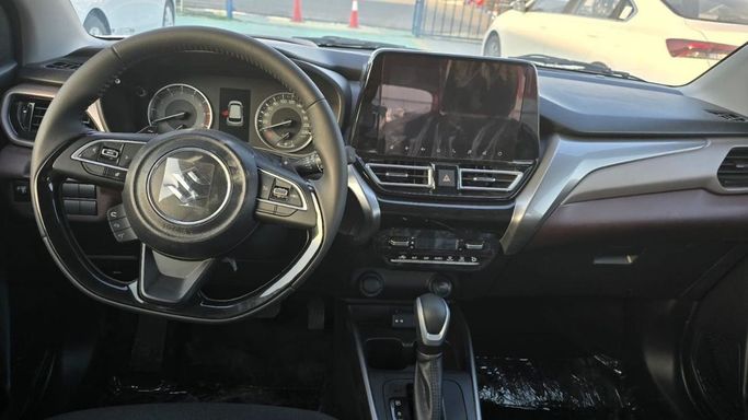 New Suzuki Fronx, 1.5 l, 2025 in Dubai by Mohamed Hakim Motors, Red color.  | AUTO.AE