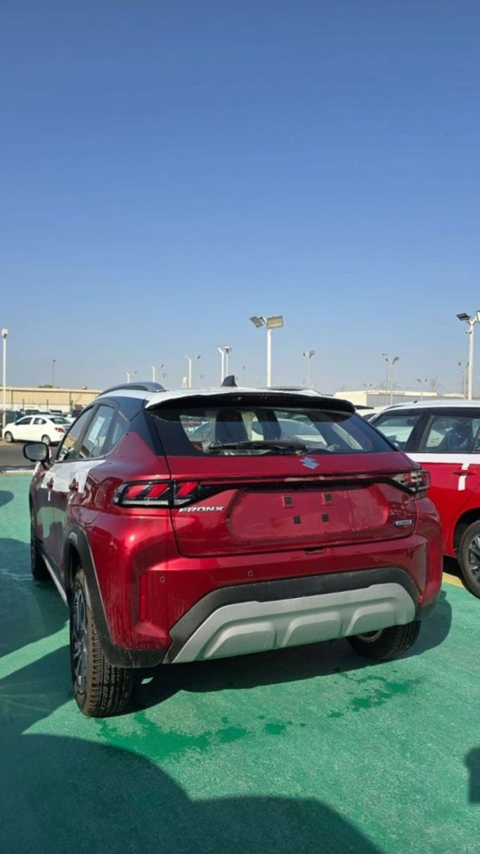 New Suzuki Fronx, 1.5 l, 2025 in Dubai by Mohamed Hakim Motors, Red color.  | AUTO.AE