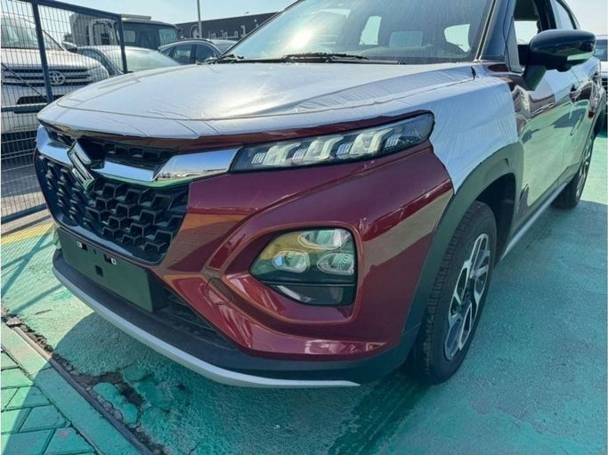 New Suzuki Fronx, 1.5 l, 2025 in Dubai by Mohamed Hakim Motors, Red color. GCC Specs | AUTO.AE