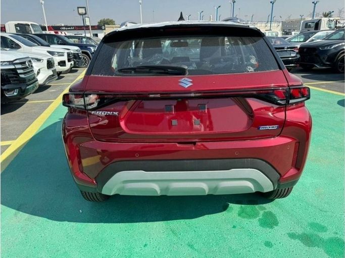 New Suzuki Fronx, 1.5 l, 2025 in Dubai by Mohamed Hakim Motors, Red color. GCC Specs | AUTO.AE