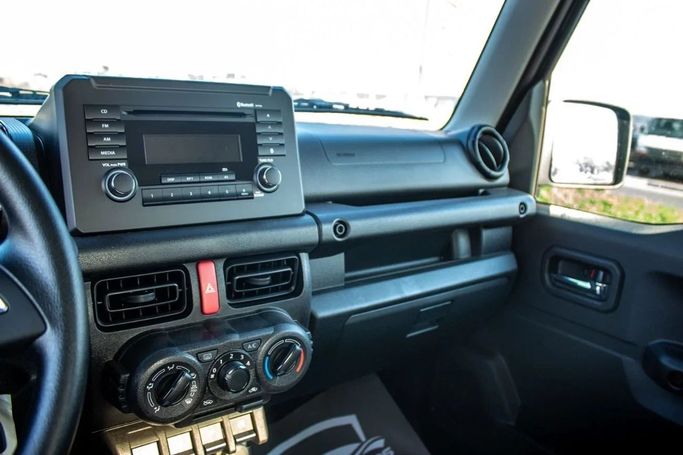 New Suzuki Jimny IV, 1.5 l, 2025 in Dubai by Mohamed Hakim Motors, Black color. GCC Specs | AUTO.AE