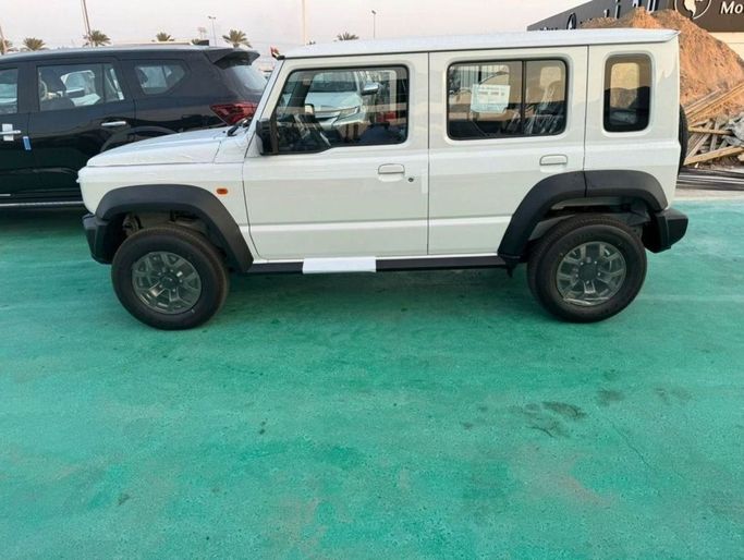 New Suzuki Jimny IV, 1.5 l, 2025 in Dubai by Mohamed Hakim Motors, White color. GCC Specs | AUTO.AE