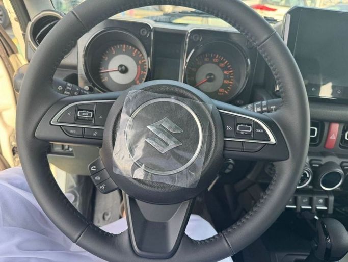 New Suzuki Jimny IV, 1.5 l, 2025 in Dubai by Mohamed Hakim Motors, White color. GCC Specs | AUTO.AE