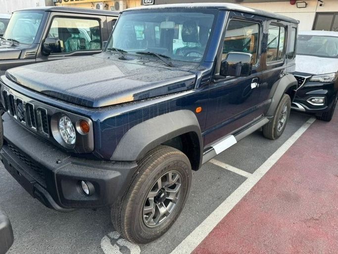 New Suzuki Jimny IV, 1.5 l, 2024 in Dubai by Mohamed Hakim Motors, Blue color. GCC Specs | AUTO.AE