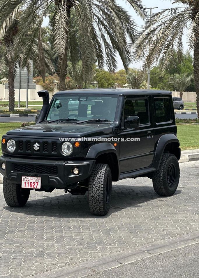 Used Suzuki Jimny IV, 1.5 l, 2023 in Dubai by Alhamd Motors, Grey color. Other | AUTO.AE