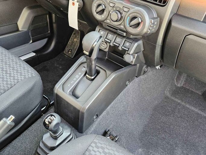 New Suzuki Jimny IV, 1.5 l, 2024 in Dubai by SK Motors, Grey color. GCC Specs | AUTO.AE