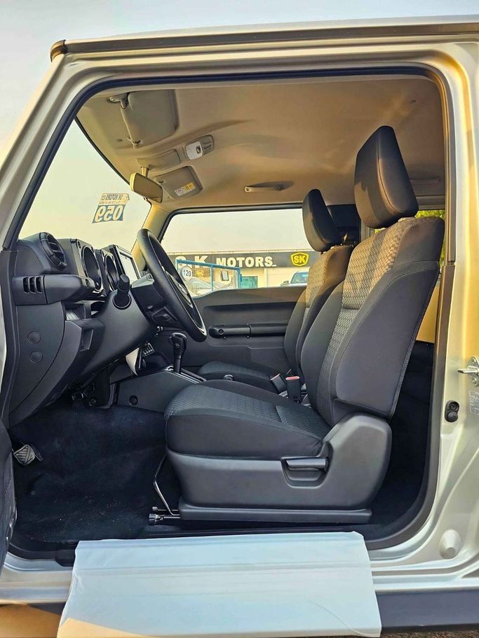 New Suzuki Jimny IV, 1.5 l, 2025 in Dubai by SK Motors, Silver color. GCC Specs | AUTO.AE