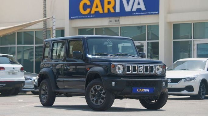 Used Suzuki Jimny IV, 1.5 l, 2024 in Dubai by Cariva Used Cars , Blue color. GCC Specs | AUTO.AE