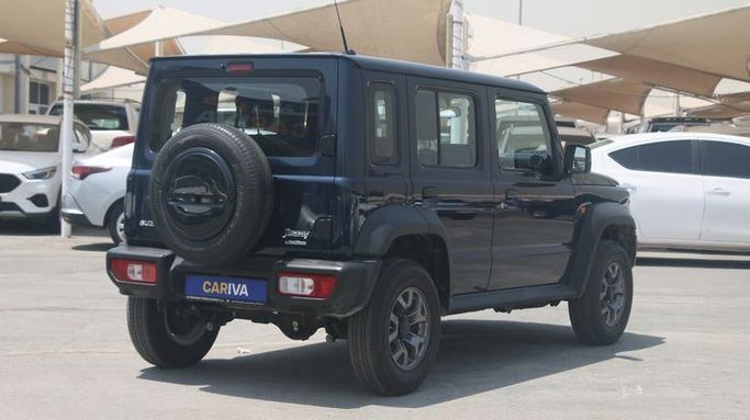 Used Suzuki Jimny IV, 1.5 l, 2024 in Dubai by Cariva Used Cars , Blue color. GCC Specs | AUTO.AE