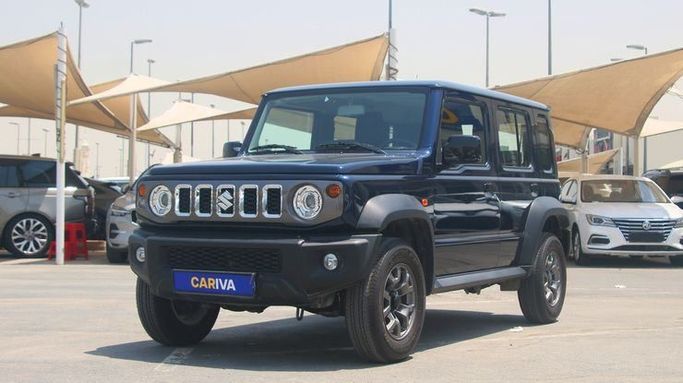 Used Suzuki Jimny IV, 1.5 l, 2024 in Dubai by Cariva Used Cars , Blue color. GCC Specs | AUTO.AE
