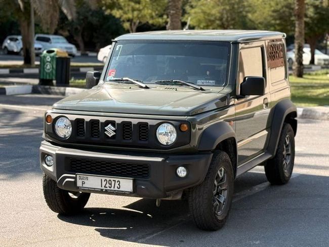 Подержанный Suzuki Jimny IV, 1.5 л, 2021 в Дубае от AL REEM AUTO Зеленый цвет. GCC | AUTO.AE