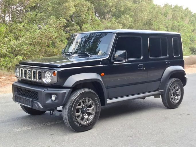 Used Suzuki Jimny IV, 1.5 l, 2024 in Dubai by Hashem Used Cars, Black color. GCC Specs | AUTO.AE