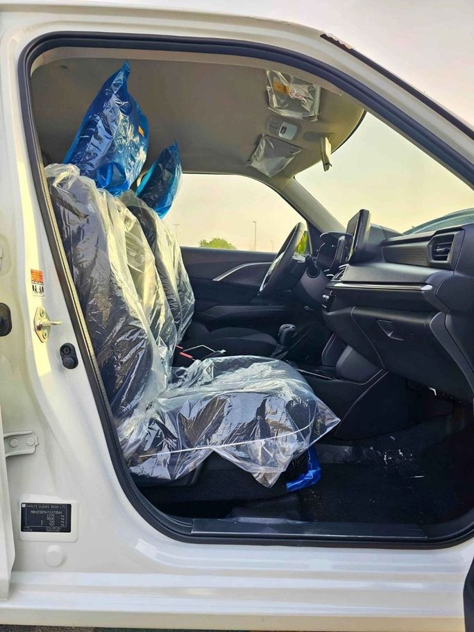 New Suzuki Swift VI, 1.2 l, 2025 in Dubai by SK Motors, White color. GCC Specs | AUTO.AE