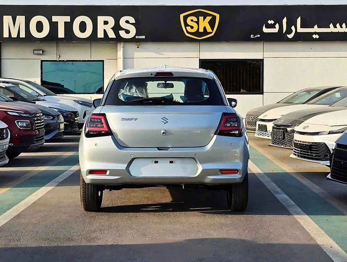 New Suzuki Swift VI, 1.2 l, 2025 in Dubai by SK Motors, Silver color. GCC Specs | AUTO.AE