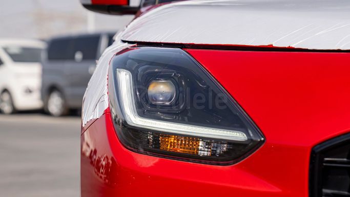 New Suzuki Swift VI, 1.2 l, 2025 in Dubai by Milele, Red color. Other | AUTO.AE