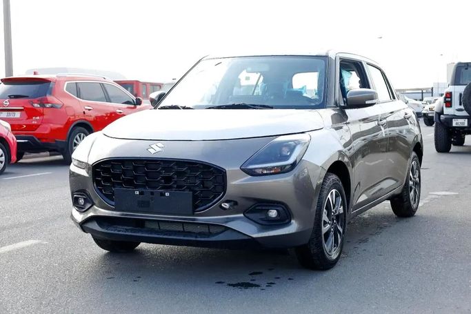 New Suzuki Swift V, 1.2 l, 2026 in Dubai by Wafrah Automotive Fzco, Grey color.  | AUTO.AE