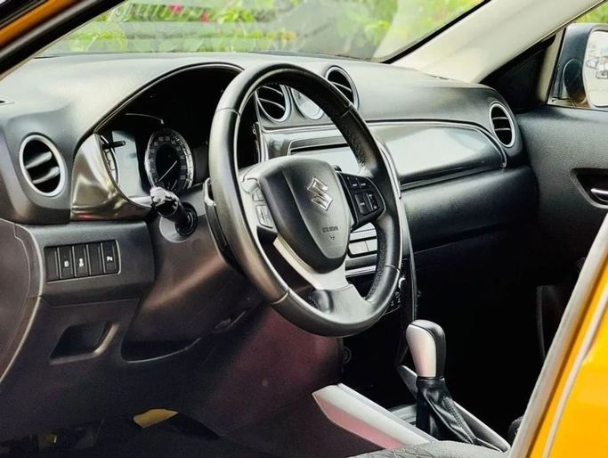 Подержанный Suzuki Vitara II Рестайлинг, 1.4 л, 2021 в Дубае от Ideal Cars LLC Желтый цвет. GCC | AUTO.AE