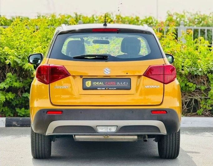 Подержанный Suzuki Vitara II Рестайлинг, 1.4 л, 2021 в Дубае от Ideal Cars LLC Желтый цвет. GCC | AUTO.AE