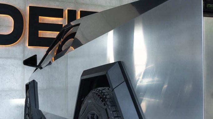 Tesla Cybertruck All-wheel Drive, 2024 electric pickup double cab for rent in Dubai by DEIZ, silver color | AUTO.AE