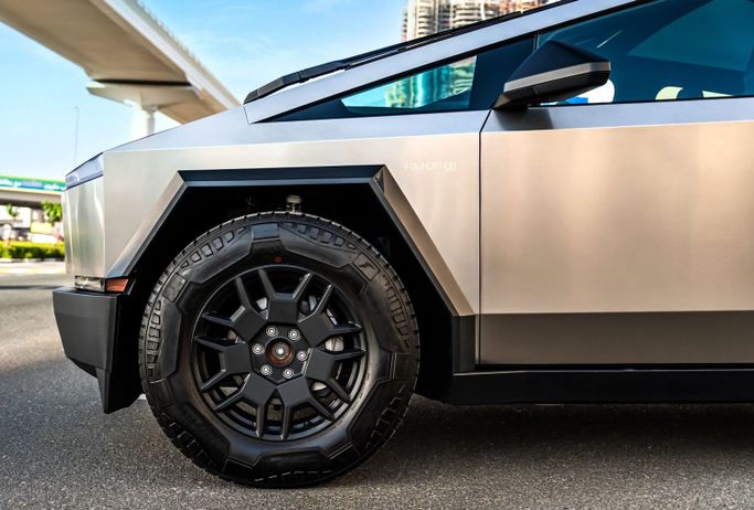 Tesla Cybertruck Cyberbeast, 2024 electric pickup double cab for rent in Dubai by POF RENTAL, silver color | AUTO.AE