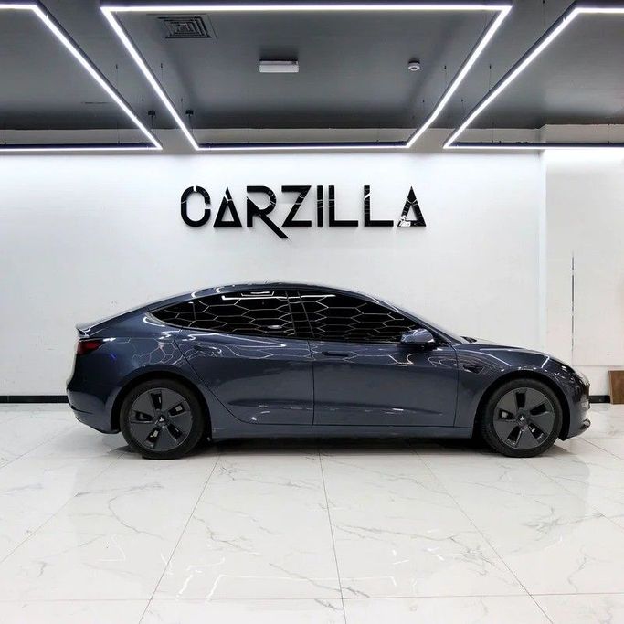 Used Tesla Model 3 Long Range I, 2023 in Dubai by Carzilla Motors, Grey color. GCC Specs | AUTO.AE