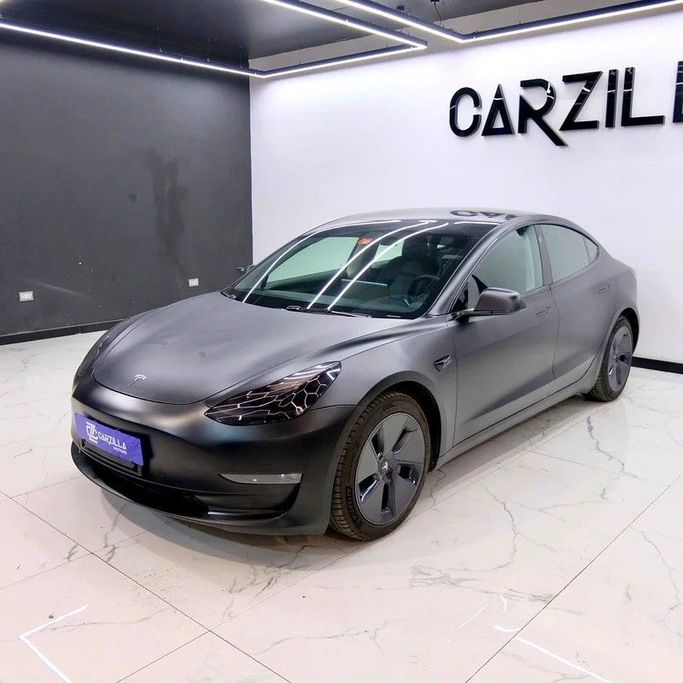 Used Tesla Model 3 Long Range I, 2021 in Dubai by Carzilla Motors, Black color. GCC Specs | AUTO.AE