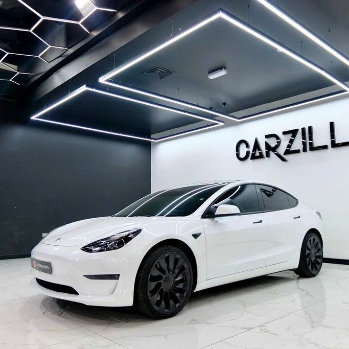 Used Tesla Model 3 Long Range I, 2023 in Dubai by Carzilla Motors, White color. GCC Specs | AUTO.AE