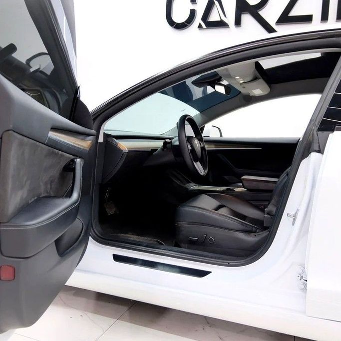 Used Tesla Model 3 Long Range I, 2023 in Dubai by Carzilla Motors, White color. GCC Specs | AUTO.AE